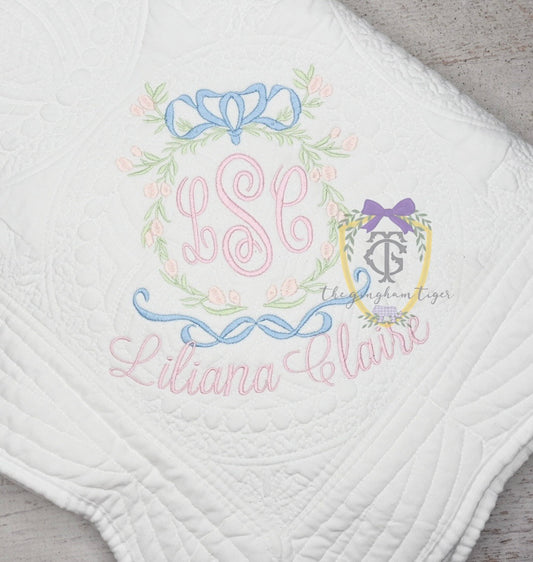 Baby Girl Heirloom Quilt with Floral Crest