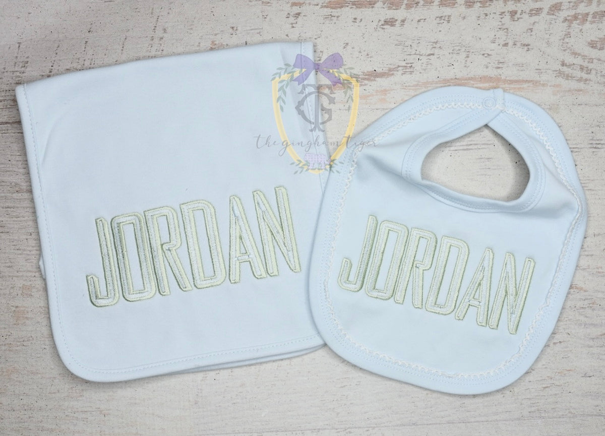 Embroidered name bib and burp set