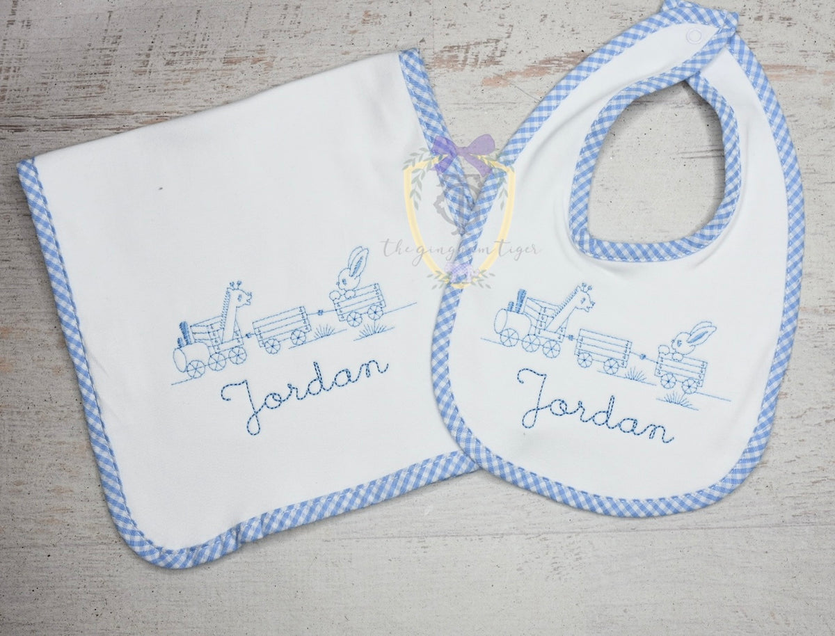 Animal Train embroidered bib and burp set